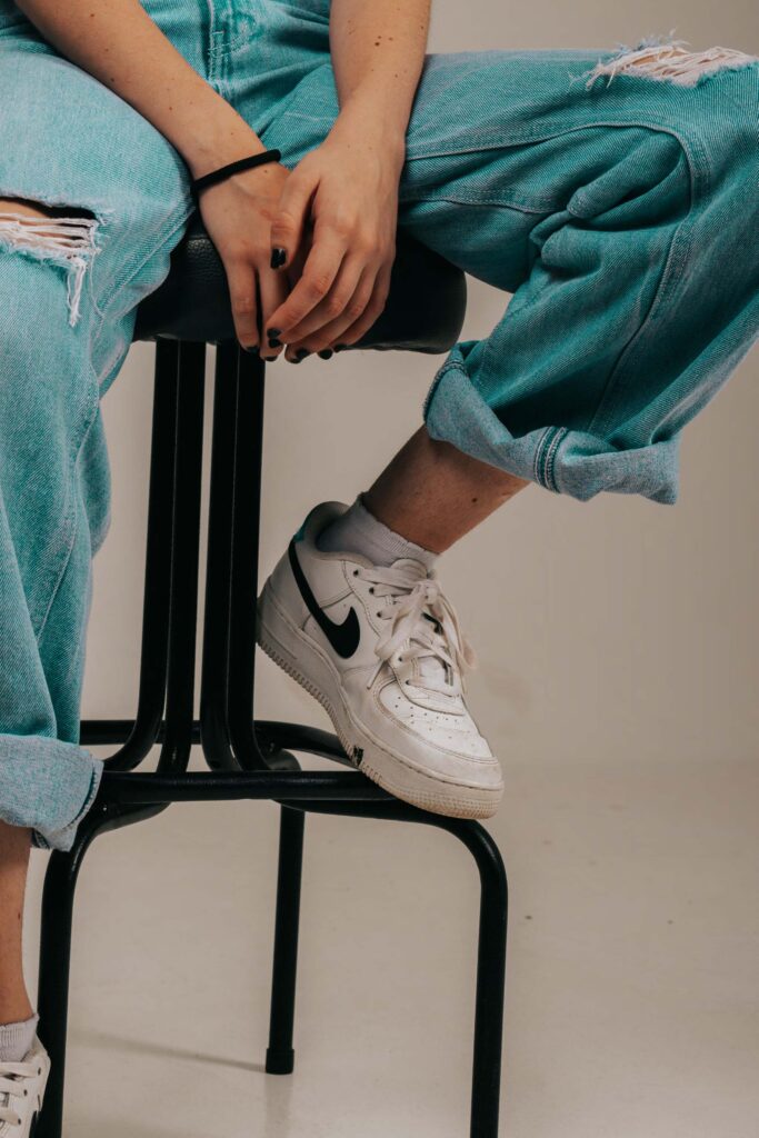 Shoes with woman on chair