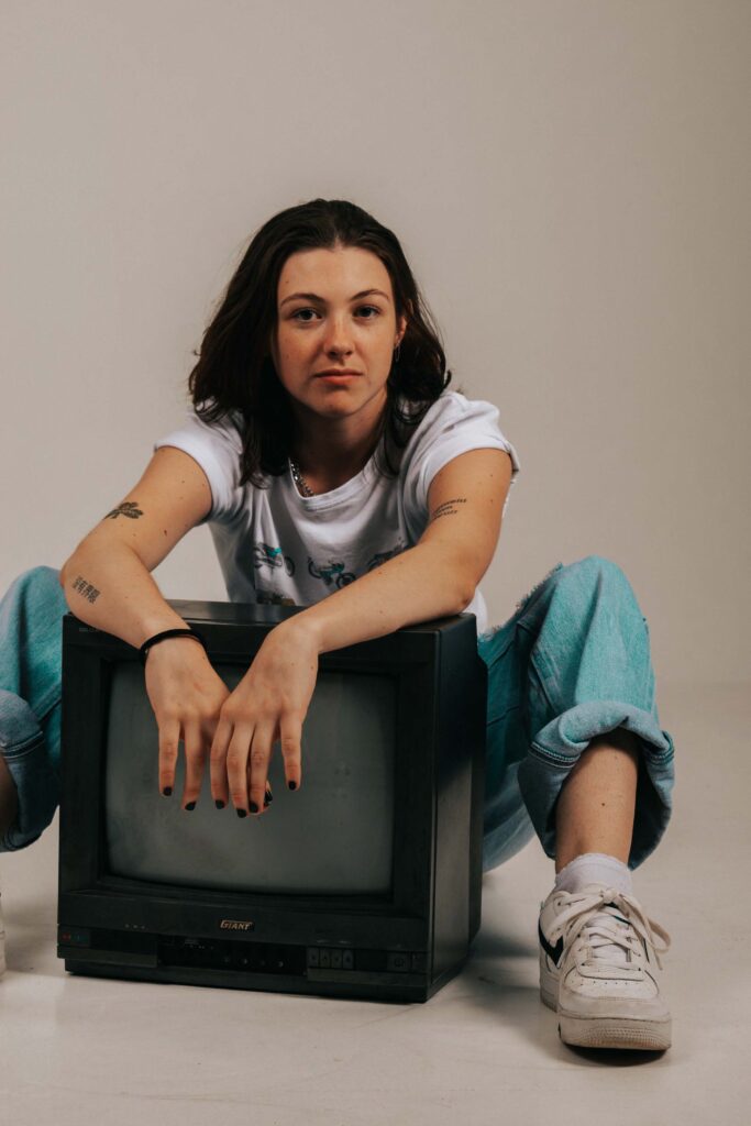 close up of woman with tv