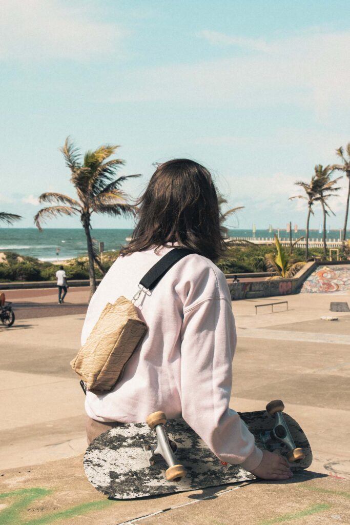 Bag and skateboard at skatepark